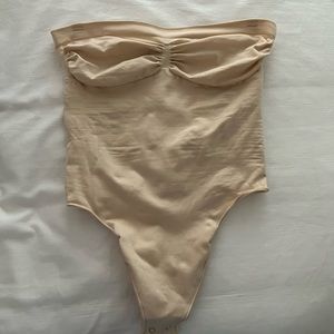 Skims convertible thong shapewear.